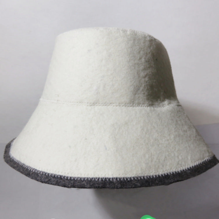 Plain off-white wool fisherman bucket hat with dark edge stitching and simple seam