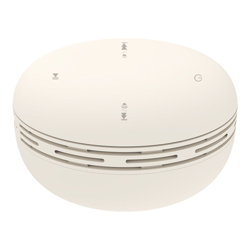 Mini Bluetooth speaker, bone white round design with vented side ring and top control icons