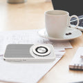 Mini portable Bluetooth speaker, white with round woofer ring and mesh speaker grille