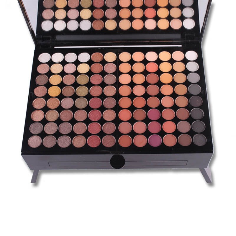 Eyeshadow palette lid with densely packed neutral, pink and warm-tone pans