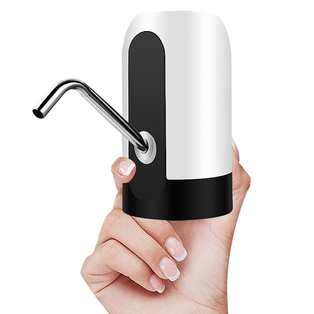 Automatic electric water bottle pump topper in hand, white and black housing with metal spout