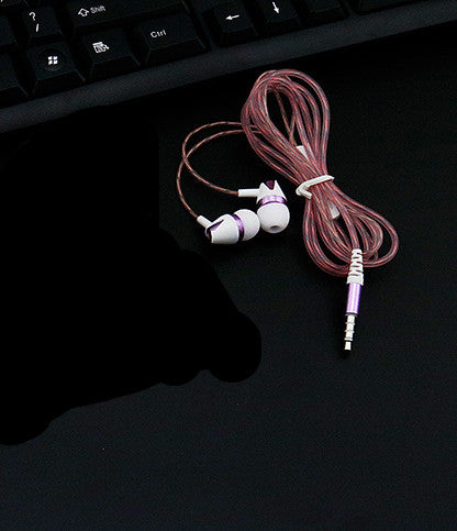 Wired in-ear headphones with white earbuds and pink braided cable with 3.5mm plug