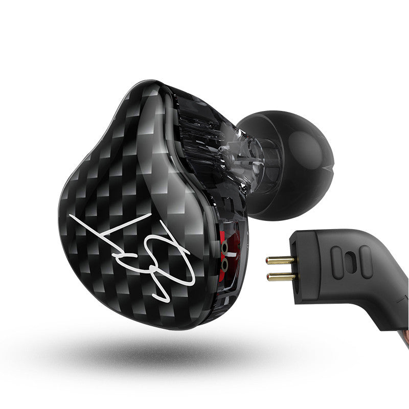 In-ear subwoofer earbuds showing driver, black, with gold plug on wired cable