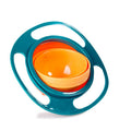 Rotating spill-proof bowl with teal outer ring and orange inner bowl