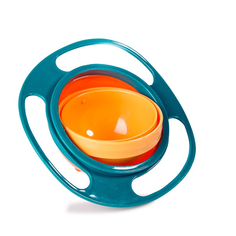 Rotating spill-proof bowl with teal outer ring and orange inner bowl