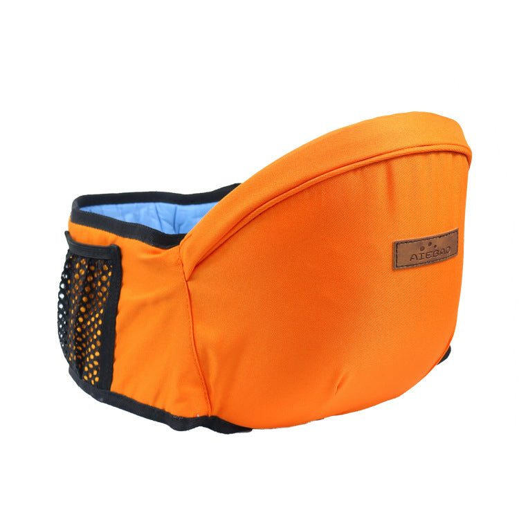 Orange baby sitting stool with black side mesh panel and tan label