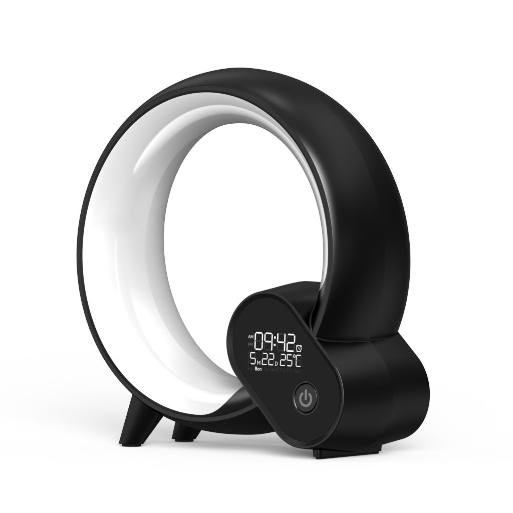 Black sunrise alarm clock with bright circular halo light and digital time display panel