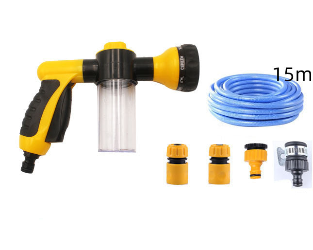 Yellow foam spray gun with clear bottle, blue hose coil, and four yellow/gray nozzles