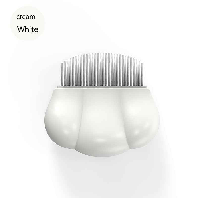 Cream white pet shedding comb with metal teeth in shell grip