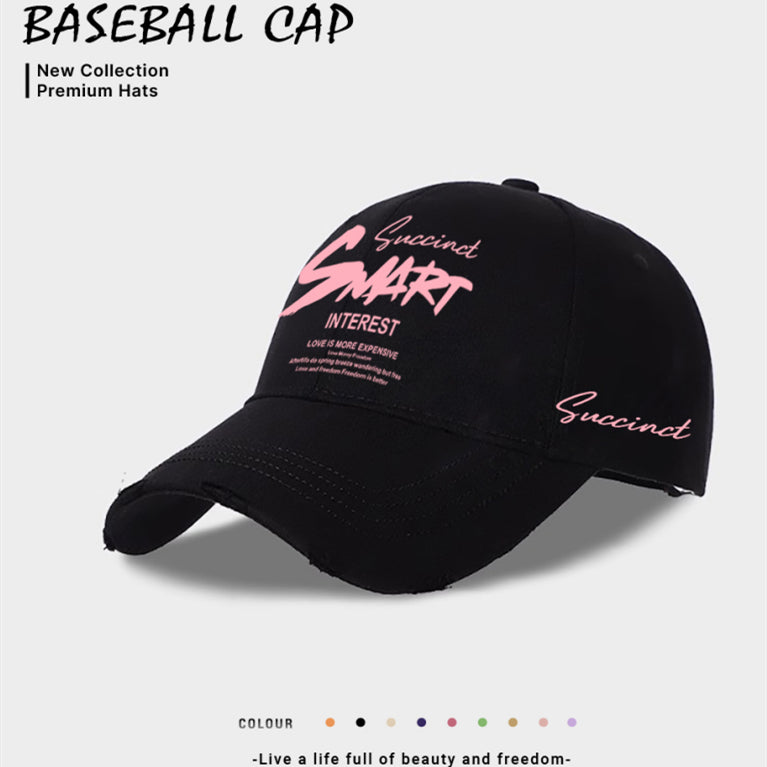 Black baseball cap with front embroidered graphic and pink “Succinct” logo