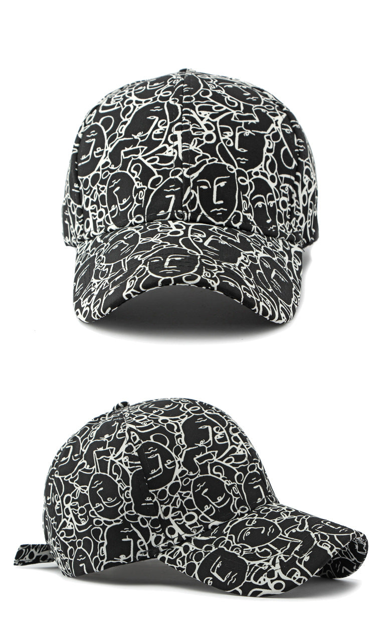 Black retro peaked cap with white face graffiti line pattern and curved brim