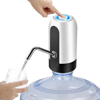 Automatic electric water bottle pump with LED light top and white/black housing dispensing water