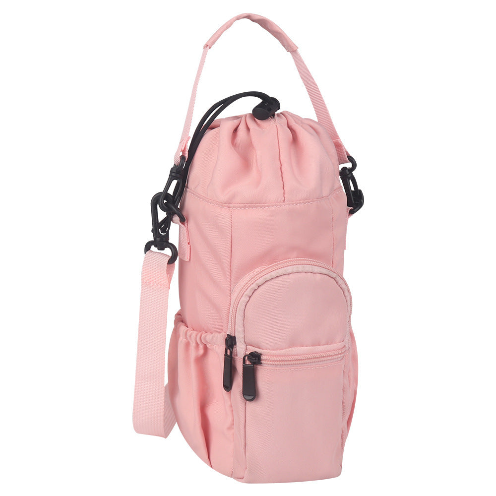 Pink bottle pouch crossbody bag with drawstring top and front zipper pocket