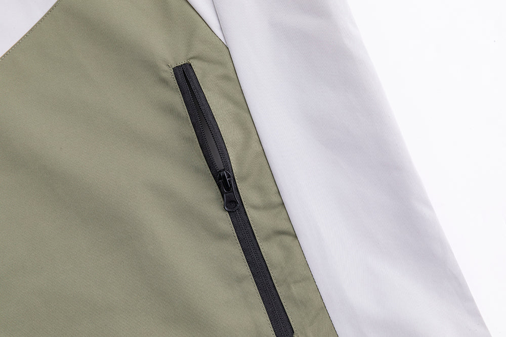 Assault suit jacket zipper placement, military green panel with white side