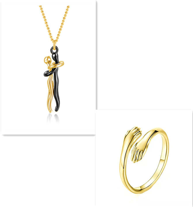 Love hug necklace with gold pendant and gold ring clasp detail on chain