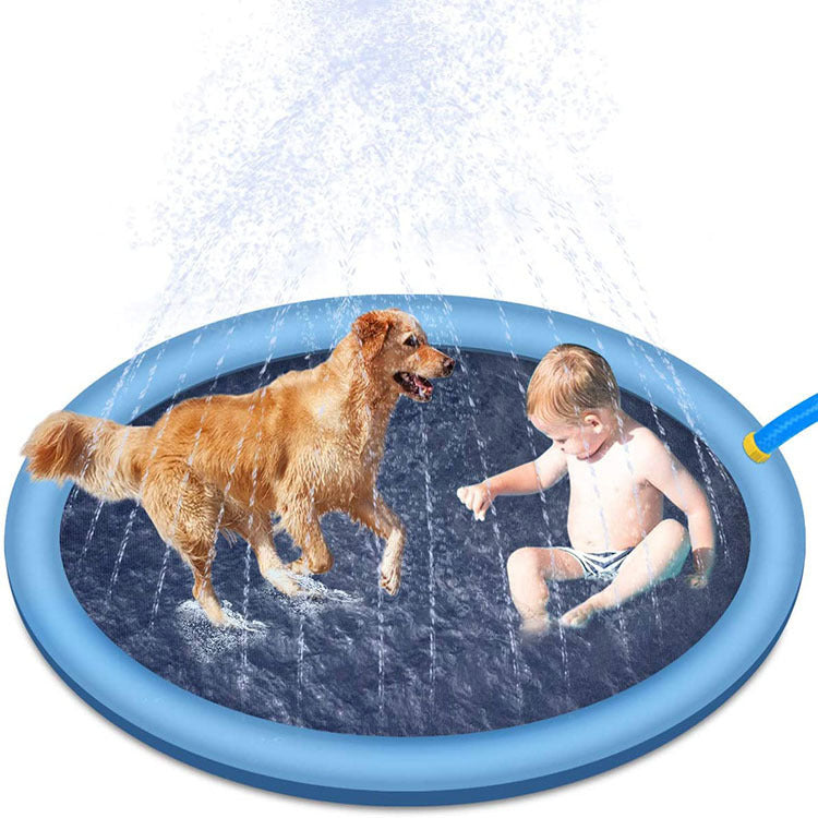 Blue round splash pad with water spray, dog beside child in shallow pool