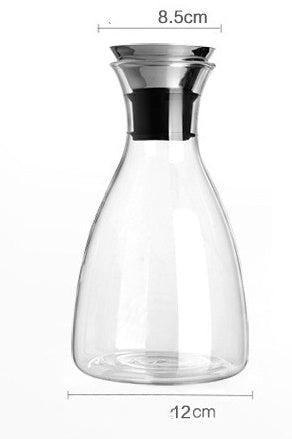 Clear glass water bottle with black neck collar, 12cm wide and 8.5cm top