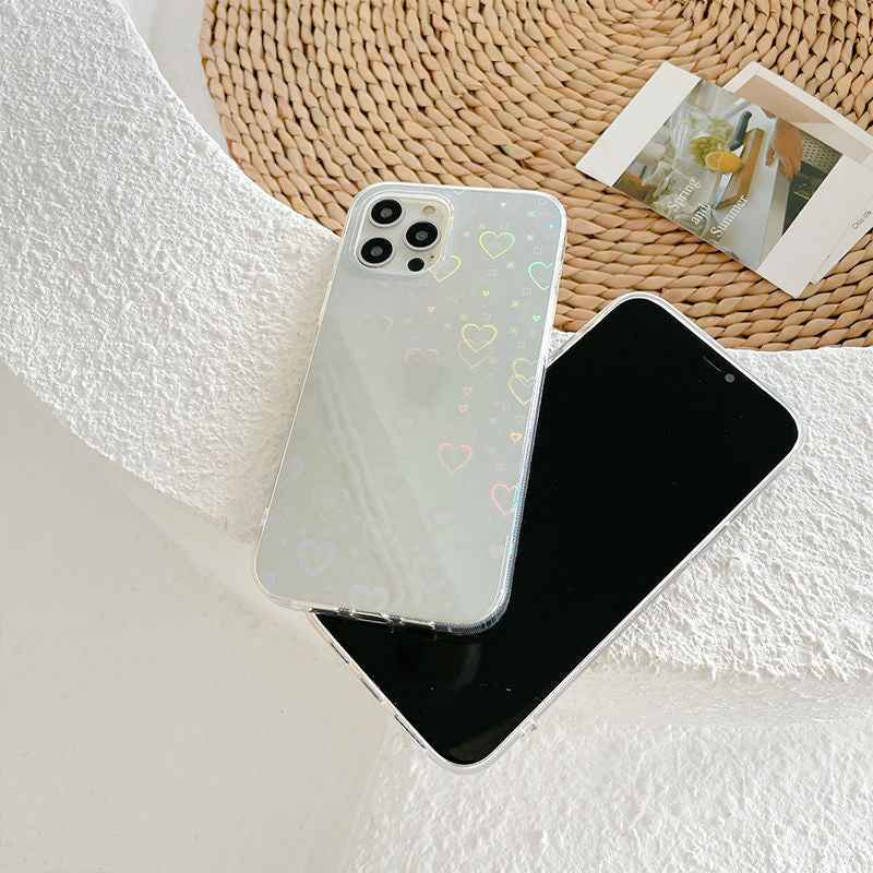 Translucent silicone phone case with pastel hearts and a plain black silicone phone case