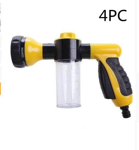 Foam spray gun with yellow body, black nozzle, and clear bottle reservoir