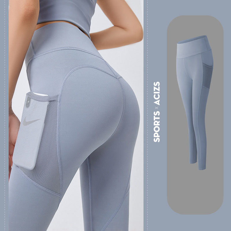 Women’s yoga leggings with phone pocket, pale blue, high-rise back view.