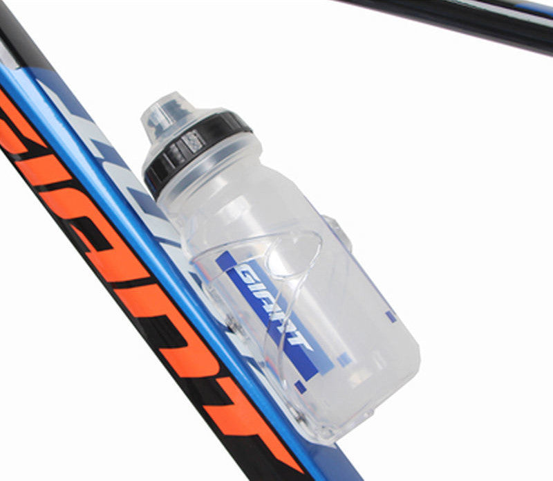 White translucent cycling water bottle with flip-top cap, mounted on blue bike frame
