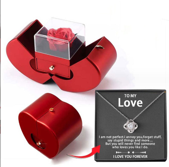 Red jewelry box with clear cover and red rose; heart pendant necklace necklace shown